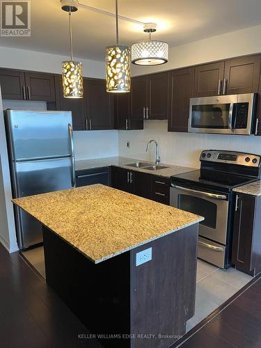 1206 - 1940 Ironstone Drive, Burlington, ON - Indoor Photo Showing Kitchen With Stainless Steel Kitchen With Double Sink