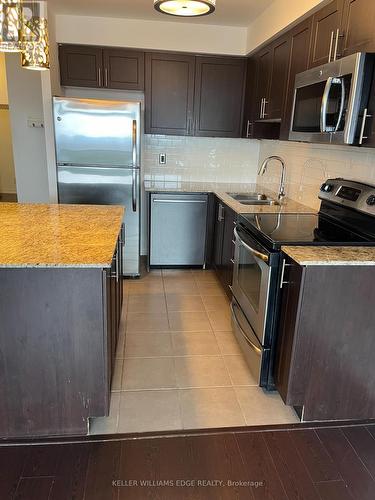 1206 - 1940 Ironstone Drive, Burlington, ON - Indoor Photo Showing Kitchen With Stainless Steel Kitchen With Double Sink