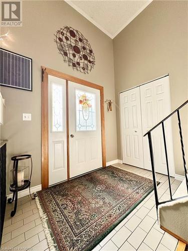 Spacious Entrance Foyer with Tile Floors - 34 Archibald Place, Southampton, ON - Indoor Photo Showing Other Room