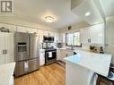 Kitchen Features Quartz Counter Tops and Stainless Appliances - 34 Archibald Place, Southampton, ON  - Indoor Photo Showing Kitchen 