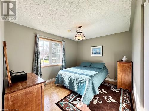 Bedroom 1 of 2 on the Main Floor with Hardwood Floors - 34 Archibald Place, Southampton, ON - Indoor Photo Showing Bedroom