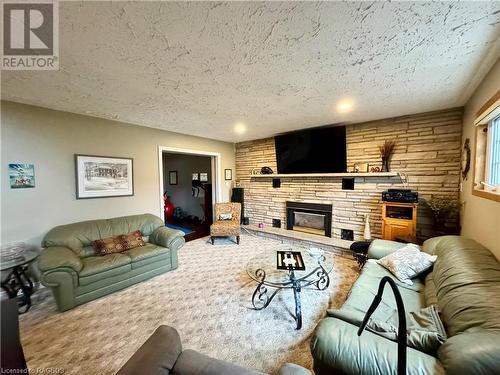 34 Archibald Place, Southampton, ON - Indoor Photo Showing Living Room With Fireplace