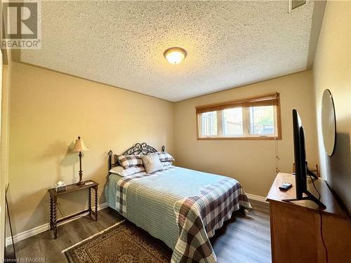 Bedroom 1 of 2 in the Lower Level with Vinyl Plank Flooring - 34 Archibald Place, Southampton, ON - Indoor Photo Showing Bedroom