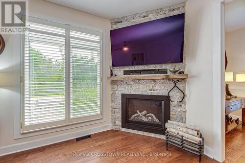 1104 Alfred Street, Innisfil, ON - Indoor Photo Showing Living Room With Fireplace