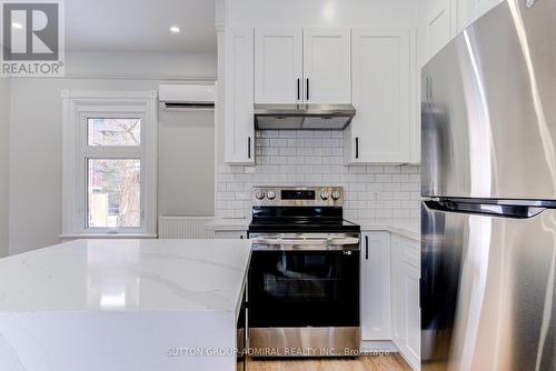 1 - 167 Collier Street, Barrie, ON - Indoor Photo Showing Kitchen With Upgraded Kitchen