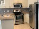 6 - 20 C Line, Orangeville, ON  - Indoor Photo Showing Kitchen With Stainless Steel Kitchen With Double Sink 