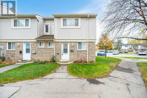 19 - 561 Childs Drive, Milton, ON - Outdoor With Facade