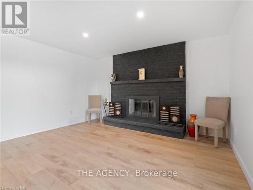 24 Keefer Road, Thorold (Confederation Heights), ON - Indoor Photo Showing Other Room With Fireplace