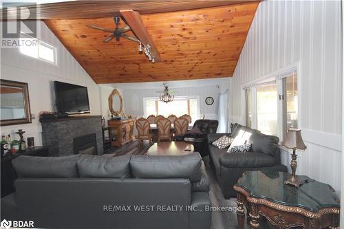 1203 Tiny Beaches Road S, Tiny, ON - Indoor Photo Showing Living Room With Fireplace