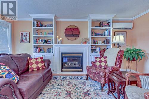 112 Harold Ct Court, Lucan Biddulph (Lucan), ON - Indoor Photo Showing Living Room With Fireplace