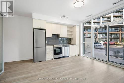 118 - 50 George Butchart Drive, Toronto, ON - Indoor Photo Showing Kitchen