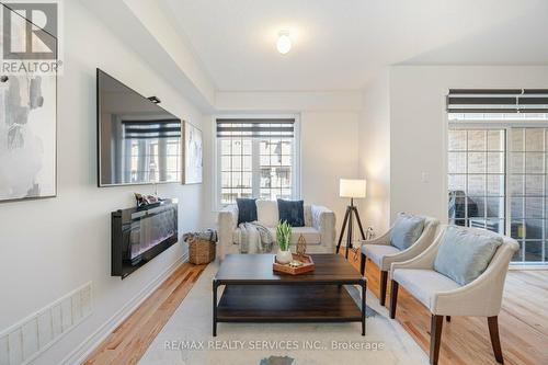 8 Haymarket Drive, Brampton, ON - Indoor Photo Showing Living Room With Fireplace