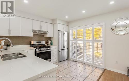 1096 Barclay Circle, Milton, ON - Indoor Photo Showing Kitchen With Double Sink