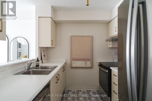 704 - 70 Mill Street, Toronto, ON - Indoor Photo Showing Kitchen With Double Sink