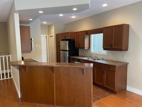 8 Bayhill Crescent, Brandon, MB - Indoor Photo Showing Kitchen With Double Sink