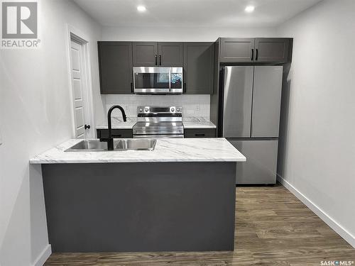 413 Germain Manor, Saskatoon, SK - Indoor Photo Showing Kitchen With Upgraded Kitchen