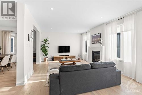 30 Conch Way, Ottawa, ON - Indoor Photo Showing Living Room With Fireplace