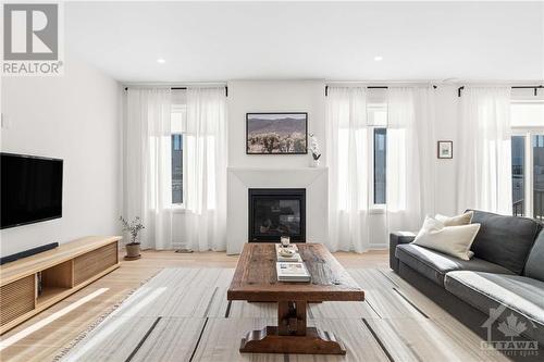 30 Conch Way, Ottawa, ON - Indoor Photo Showing Living Room With Fireplace