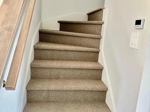 Staircase - 78 Rue Des Récoltes, Sainte-Barbe, QC - Indoor Photo Showing Other Room