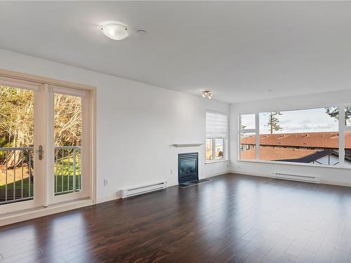 214-350 Island Hwy South, Campbell River, BC - Indoor Photo Showing Living Room With Fireplace