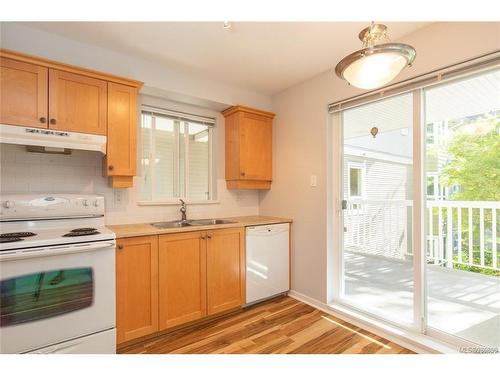 207-5660 Edgewater Lane, Nanaimo, BC - Indoor Photo Showing Kitchen With Double Sink