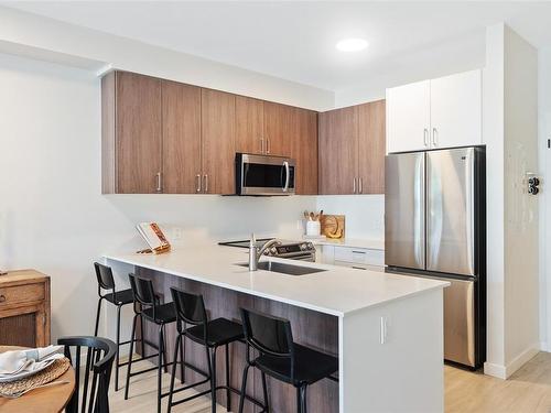 404-810 Orono Ave, Langford, BC - Indoor Photo Showing Kitchen With Stainless Steel Kitchen