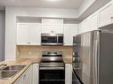 318-3504 Hurontario St, Mississauga, ON  - Indoor Photo Showing Kitchen With Stainless Steel Kitchen With Double Sink 