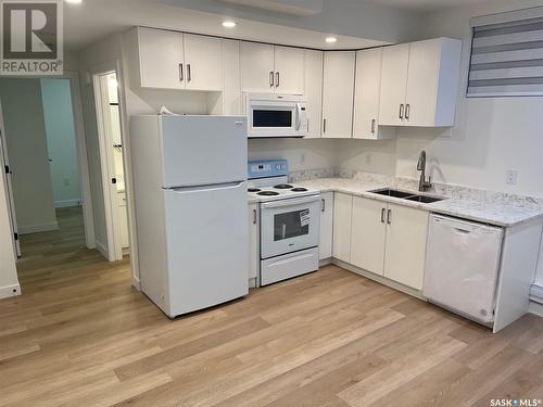 715 Kenaschuk Link, Saskatoon, SK - Indoor Photo Showing Kitchen With Double Sink