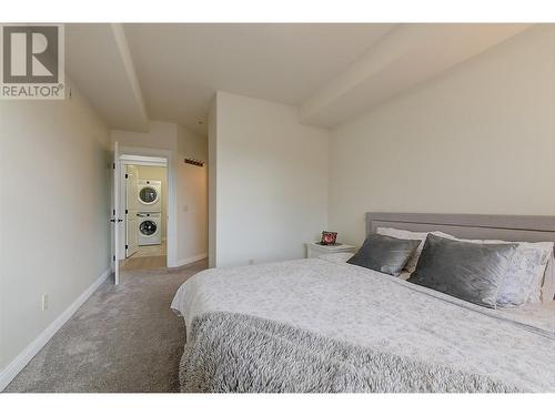 Spacious primary bedroom - 2770 Auburn Road Unit# 201, West Kelowna, BC - Indoor Photo Showing Bedroom