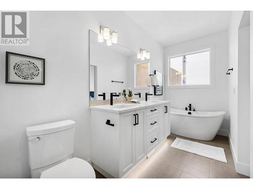 Photos from the developers showhome of the same floor plan - 7735 Okanagan Hills Boulevard Unit# 58, Vernon, BC - Indoor Photo Showing Bathroom