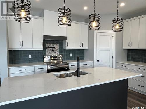 5218 E Green Crescent, Regina, SK - Indoor Photo Showing Kitchen With Double Sink With Upgraded Kitchen