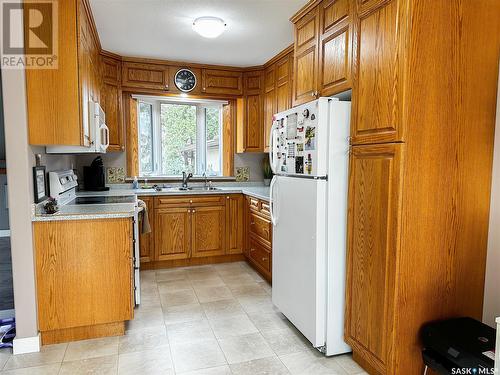 2072 96Th Street, North Battleford, SK - Indoor Photo Showing Kitchen With Double Sink