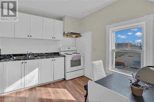 561 Riverside Drive East, Windsor, ON - Indoor Photo Showing Kitchen With Double Sink