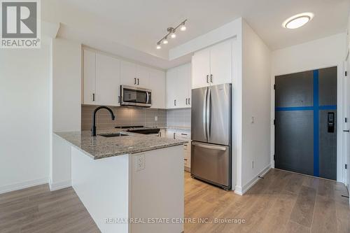 608 - 345 Wheat Boom Drive, Oakville, ON - Indoor Photo Showing Kitchen