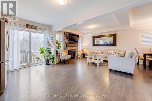 303 Yates Drive, Milton, ON - Indoor Photo Showing Living Room With Fireplace