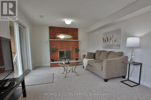 1830 Stratton Avenue, Peterborough (Otonabee), ON - Indoor Photo Showing Living Room With Fireplace