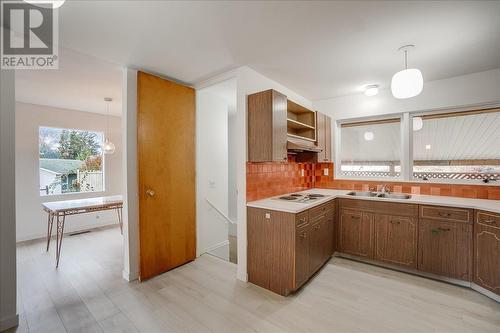 1110 Mcdiarmid Road, Castlegar, BC - Indoor Photo Showing Kitchen With Double Sink