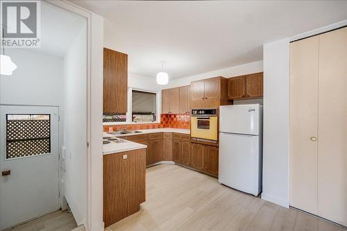 1110 Mcdiarmid Road, Castlegar, BC - Indoor Photo Showing Kitchen With Double Sink