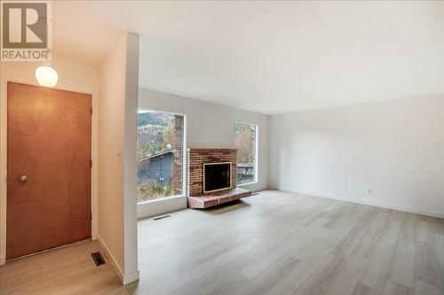 1110 Mcdiarmid Road, Castlegar, BC - Indoor With Fireplace