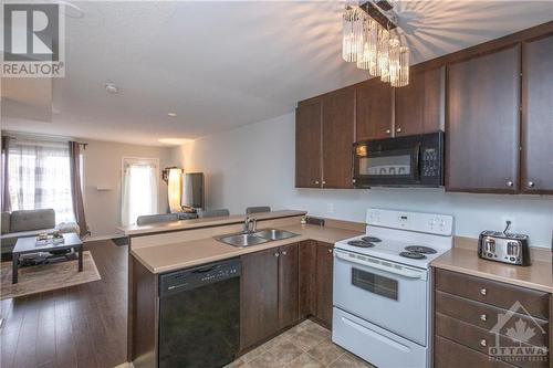 Open kitchen - 294 Espin Heights, Ottawa, ON - Indoor Photo Showing Kitchen With Double Sink