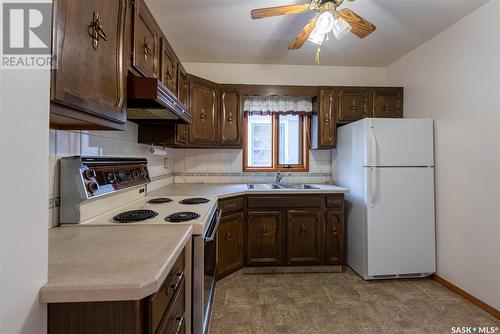 2215 Athol Street, Regina, SK - Indoor Photo Showing Kitchen With Double Sink