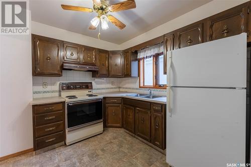 2215 Athol Street, Regina, SK - Indoor Photo Showing Kitchen With Double Sink