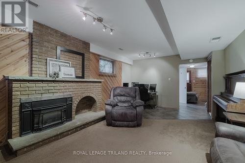 1649 Aldersbrook Road, London, ON - Indoor Photo Showing Living Room With Fireplace