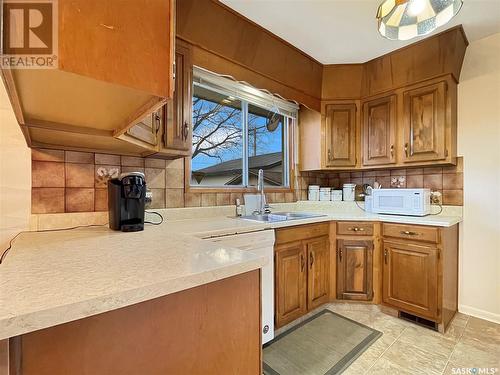 9026 16Th Avenue, North Battleford, SK - Indoor Photo Showing Kitchen With Double Sink