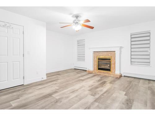 12410 90A Avenue, Surrey, BC - Indoor Photo Showing Living Room With Fireplace