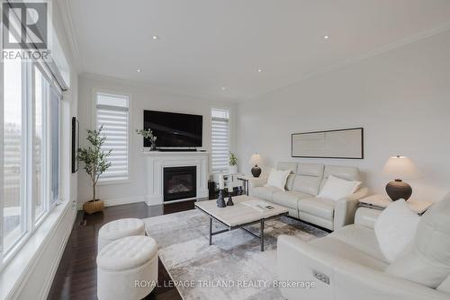 2287 Springridge Drive, London, ON - Indoor Photo Showing Living Room With Fireplace