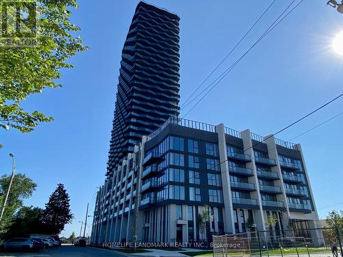 2002 - 36 Zorra Street, Toronto, ON - Outdoor With Balcony With Facade