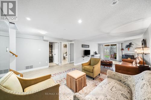 15 - 2155 Duncaster Drive, Burlington, ON - Indoor Photo Showing Living Room With Fireplace