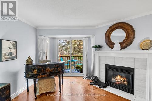 15 - 2155 Duncaster Drive, Burlington, ON - Indoor Photo Showing Living Room With Fireplace