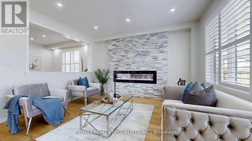 121 Longboat Run Road W, Brantford, ON - Indoor Photo Showing Living Room With Fireplace